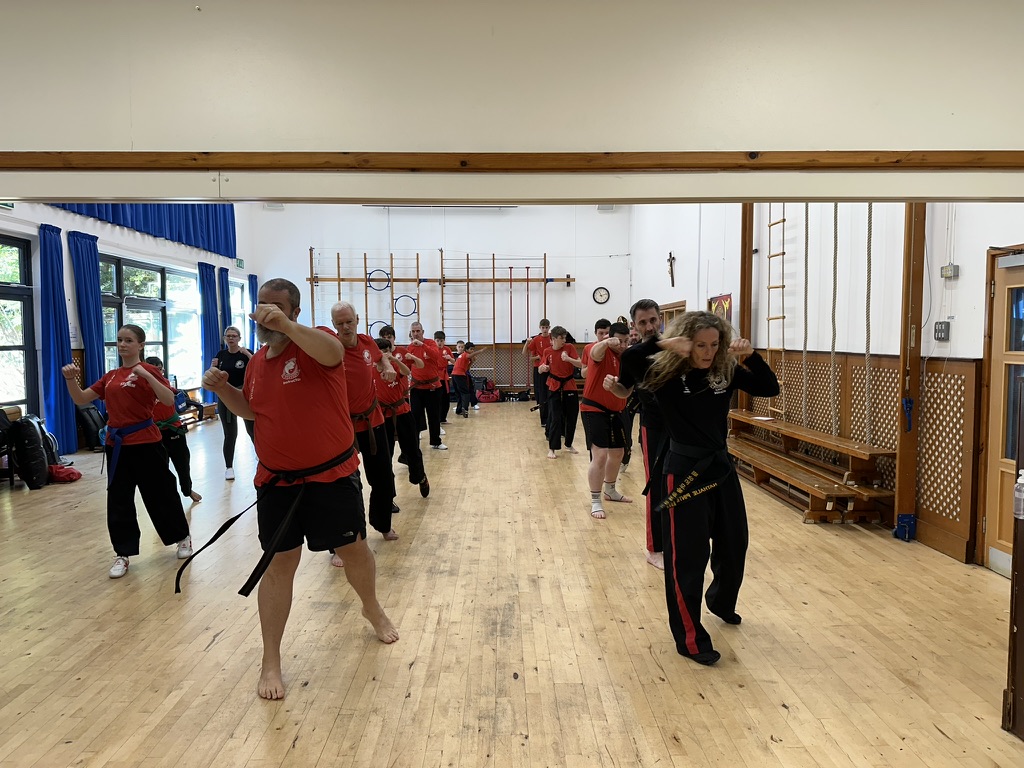 A martial arts fitness class at Pil Sung Do
